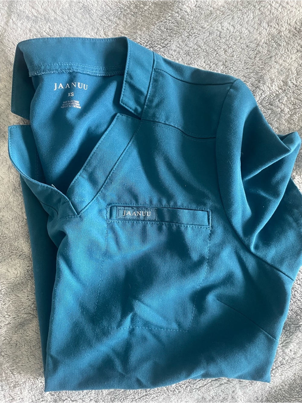 Jaanuu Woman’s Teal V-Neck Scrub Top